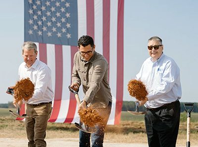 Composite image with left panel showing site plan of Rivian’s Stanton Springs North EV plant in Georgia and right panel showing rendering of landscaped creekside boardwalk near the future factory.