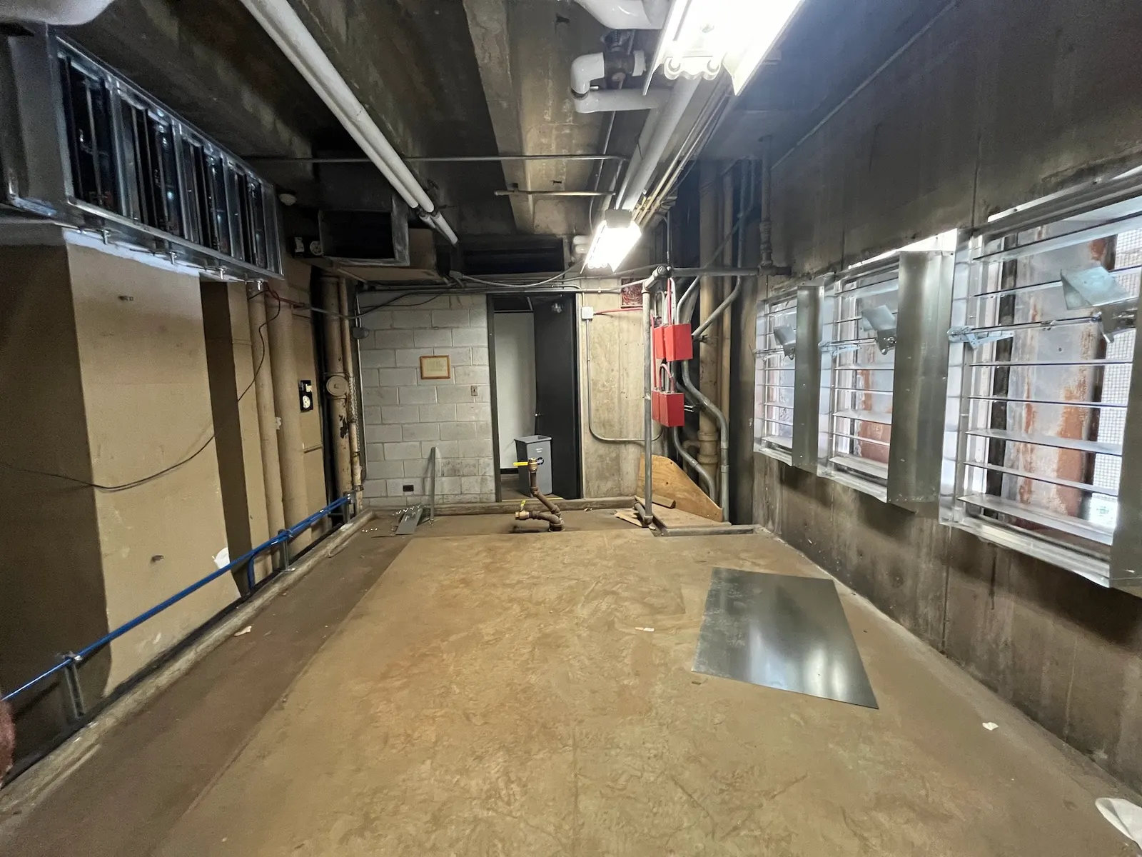 An empty room during air handling unit upgrades.