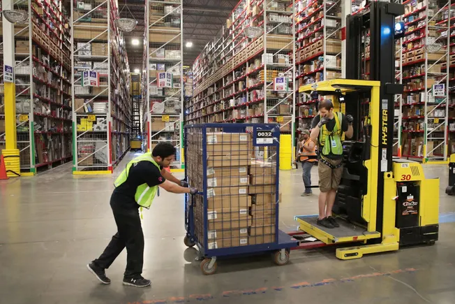 Amazon targets carbon emission cuts at grocery fulfillment centers